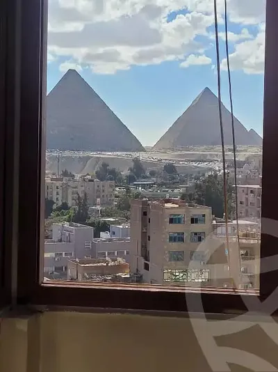 شقه للبيع على شارع فيصل الرئيسي فيو الاهرمات 