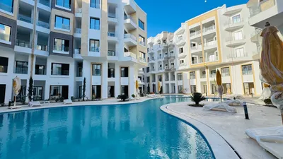 شقه غرفه وصاله 99 متر ب pool view بالاحياء بالغردقة استلام فوري 