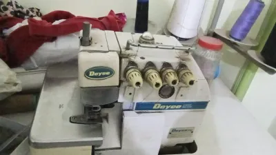 ماكينة خياطة أوفر 